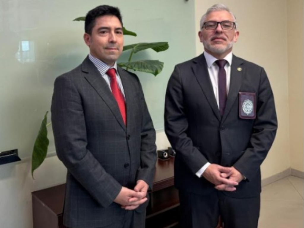 imagen del director sermig y prefecto PDI